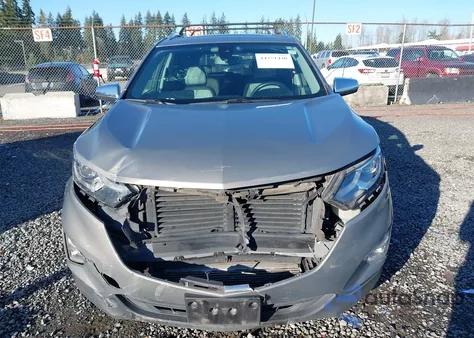 2018 Chevrolet Equinox Premier z USA, uszkodzony, nr VIN 3GNAXWEX4JS520423